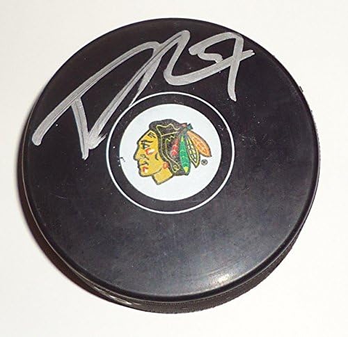 Trevor van Rimsdike potpisao je suvenirnu loptu Chicago Blackhocks sezone /17 s autogramima igrača NHL-a.