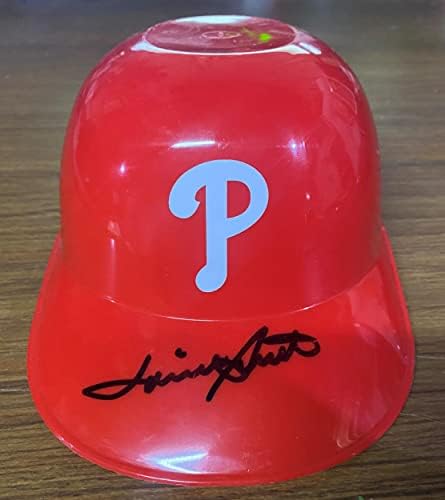 Mini kaciga s autogramom Lonnie Smith iz Philadelphia Phillies. Kaciga bi mogla imati neke ogrebotine, prodaje se takva kakva je s
